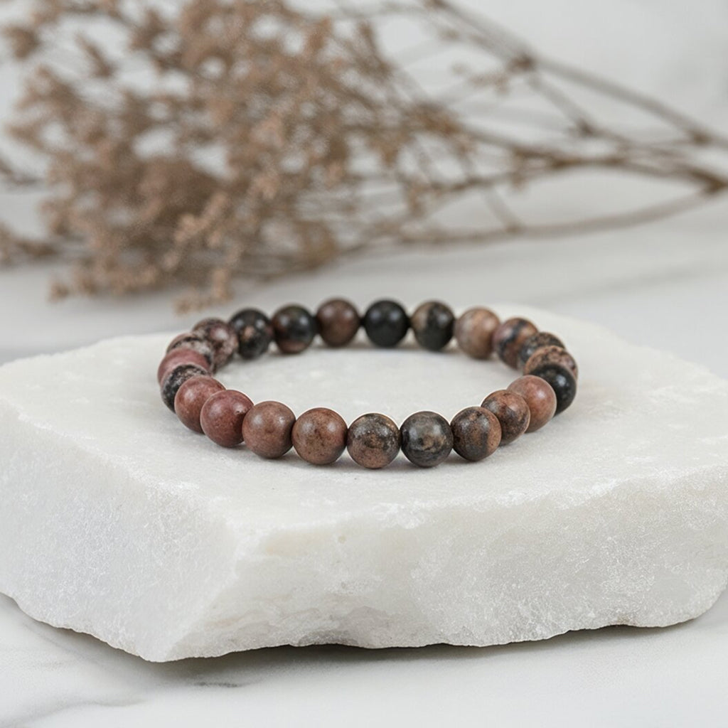 https://cdn.shopify.com/s/files/1/0717/6706/4739/files/Rhodonite_201.jpg?v=1758204018