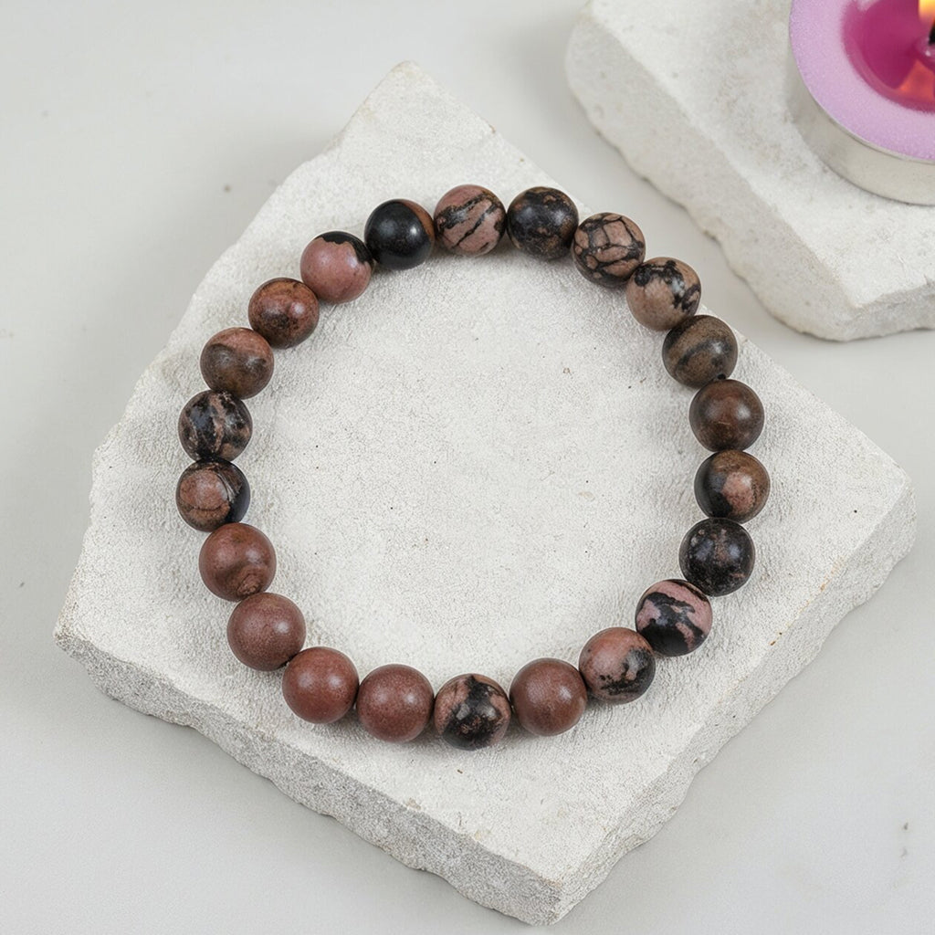 https://cdn.shopify.com/s/files/1/0717/6706/4739/files/Rhodonite_202.jpg?v=1758204018
